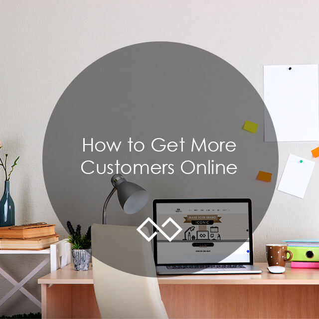 Modern Workspace With Text Titled "How To Get More Customers Online" Overlaying The Top