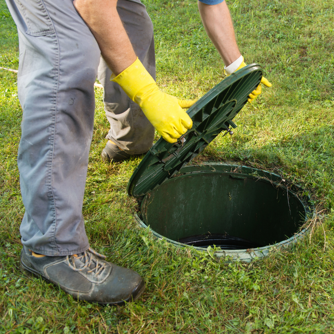 A photo for a septic company case study showing a person covering a septic tank with a lid